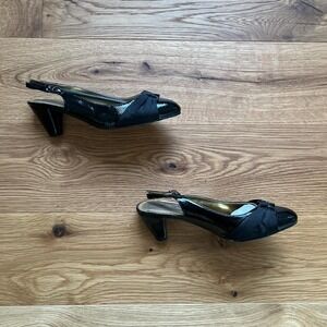 Black kitten heel courts with bow detail